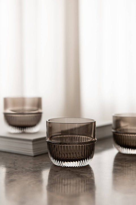Table Noir Smoked Glass designed by Rikke Malling