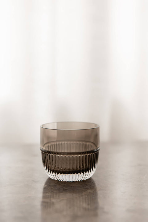 Table Noir Smoked Glass designed by Rikke Malling