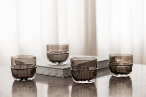 Table Noir Smoked Glass designed by Rikke Malling