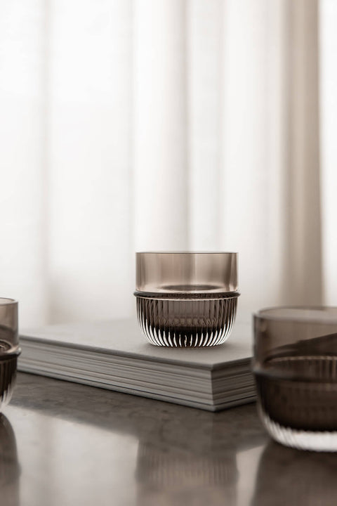 Table Noir Smoked Glass designed by Rikke Malling